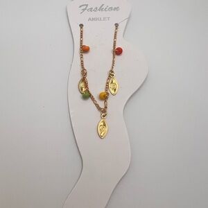 Anklet with eye charms design and colorful beats.